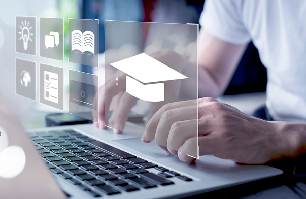 typing on a computer with visual icon blocks