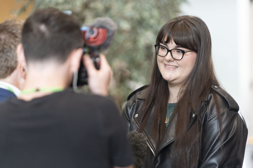 Mollie Fairlees smiling for a camera